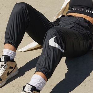 Nike windbreak pants with belt detail, slight drop crotch. great condition